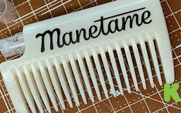 Manetame Comb: Curved Comb with Sprayer media 1