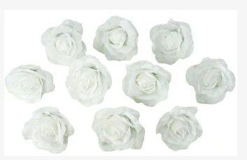 White Rose Heads By The Brides Bouquet