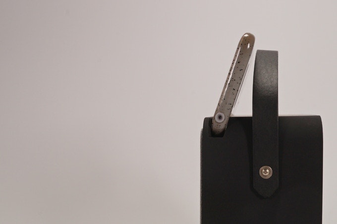 This speaker wirelessly charges your phone while it plays music without connecting to Bluetooth or WiFi gallery image