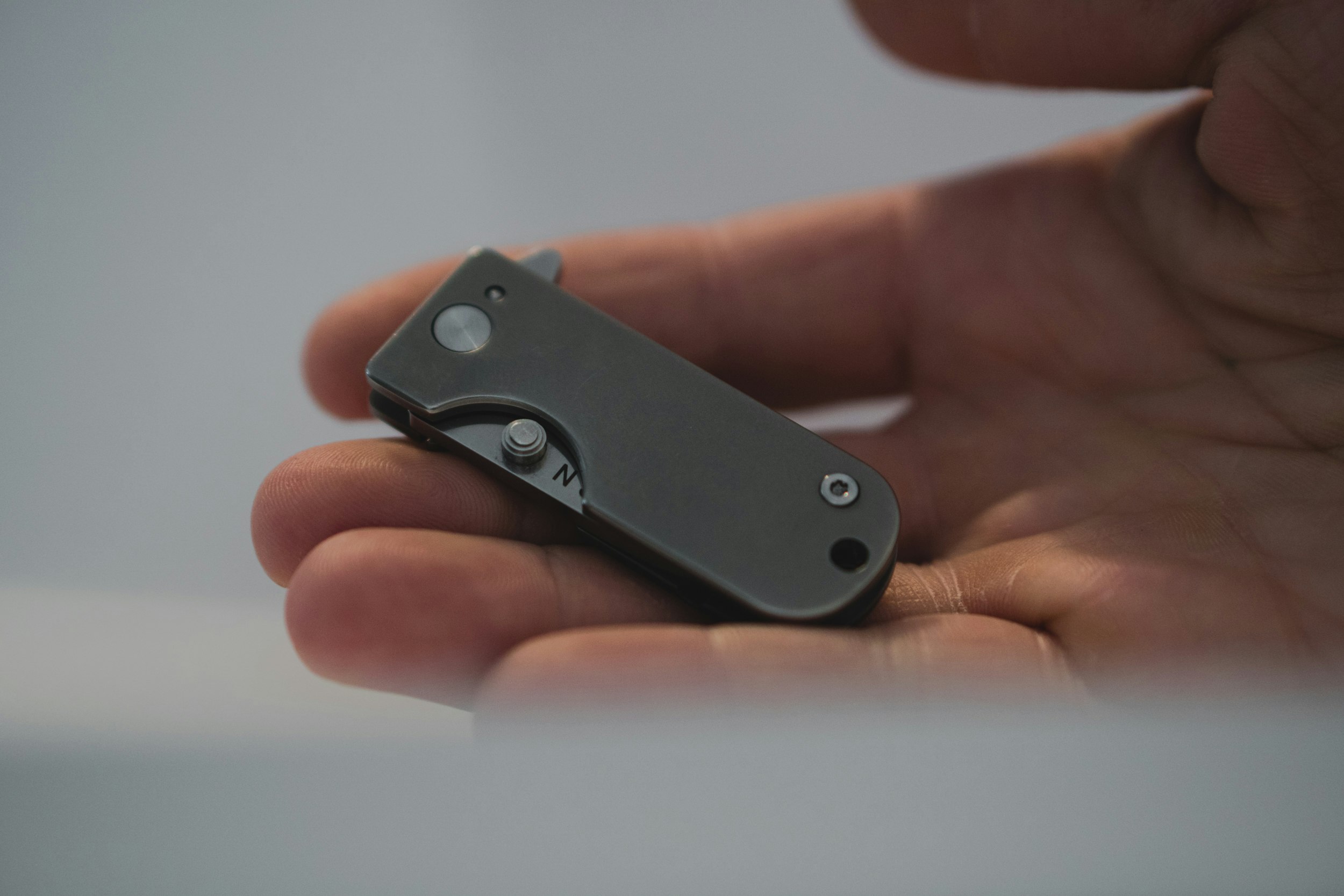 The WESN Titanium Micro Blade EDC Pocket Knife gallery image