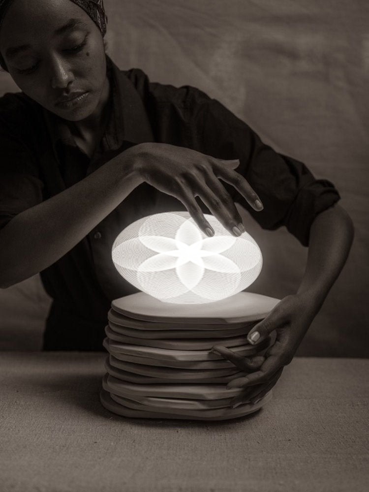 The Light Between Oracle Experience logo