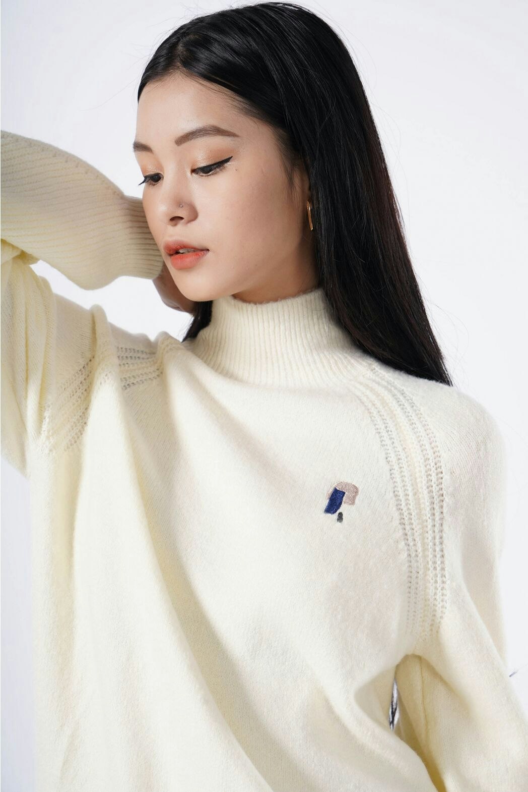 Áo dài tay dệt kim cổ lọ